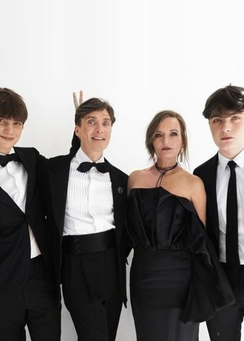 Group of people in formal attire.